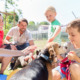 A happy family with an adopted dog.